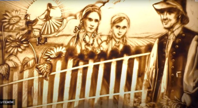 Kadr z filmu przedstawiający rysowaną piaskiem kulturę lasowiacką regionu niżańskiego