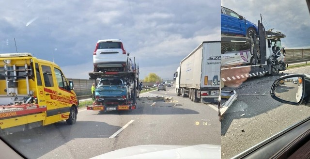 Zderzenie dwóch samochodów ciężarowych, w tym ciężarówki przewożącej samochody osobowe.