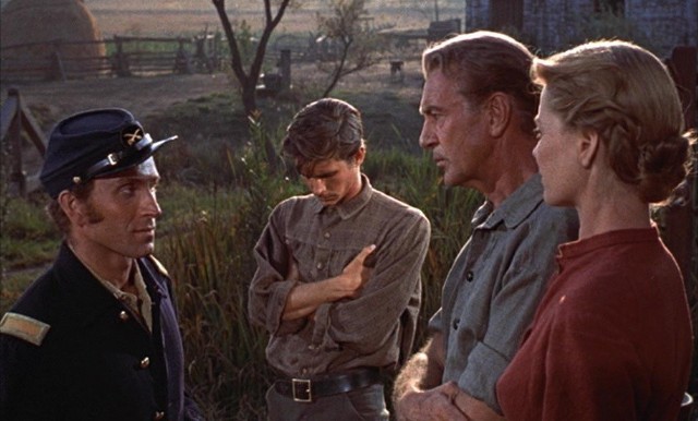 Gary Cooper jako Jess Birdwell (drugi z prawej) i Dorothy McGuire