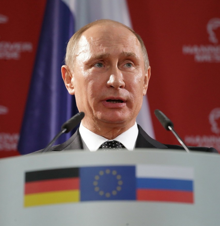 Rosyjski prezydent Władimir Putin przemawiający podczas...