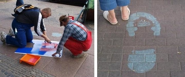 Znaki w kształcie odcisku stopy namalowane na chodnikach prowadzą do zabytków w Słupsku.