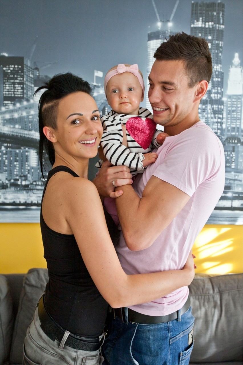 Aneta i Maciej Sadlok oraz ich córeczka Amelka w 2014 roku