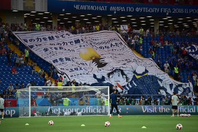 Jeszcze przed meczem japońscy kibice rozwinęli transparent z podobizną... Tsubasy.