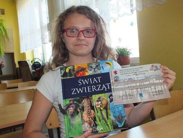 W nagrodę za zajęcie trzeciego miejsca w Polsce Ola Barszcz dostała piękny album i oczywiście dyplomy.