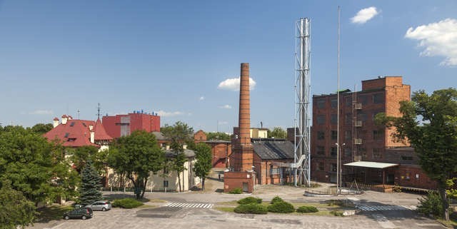 Fabryka przy ul. Olbrachta w Toruniu powstała w 1884 roku z inicjatywy rodziny Hirschfeldów. Przez 130 lat istnienia zakład był wiele razy rozbudowywany