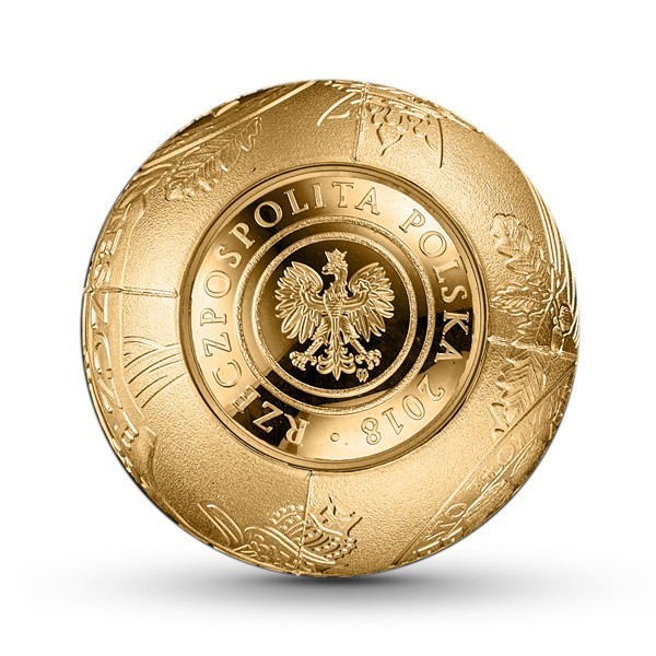 Złota moneta w kształcie kuli