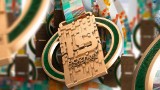 Poznaliśmy medal 15. Poznań Półmaratonu. W tym roku ma on zieloną barwę, bo partnerem biegu została Warta Poznań