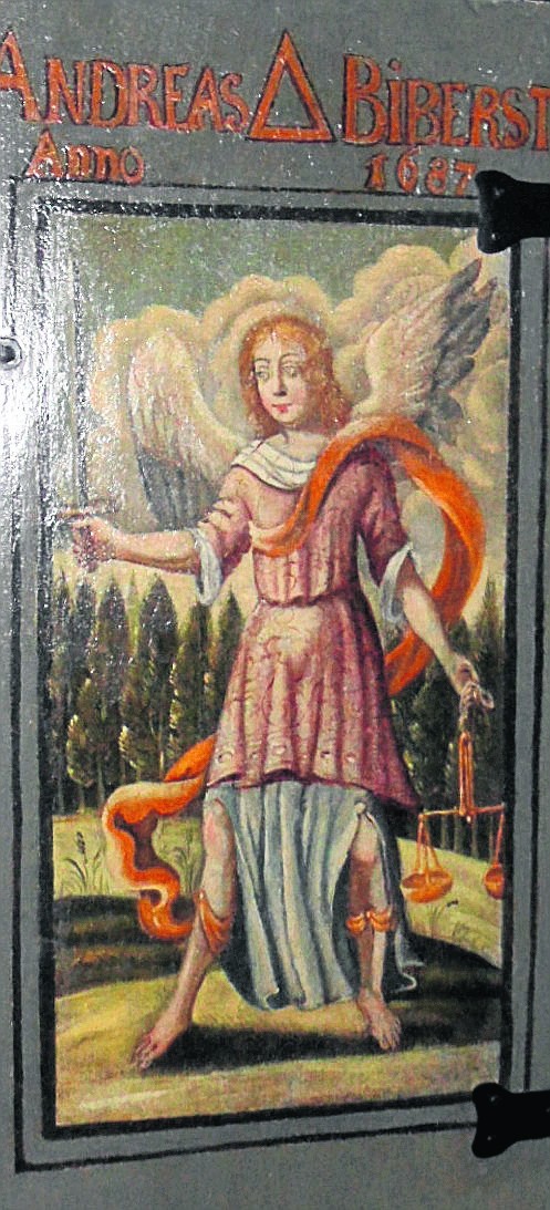 Wizerunek archanioła Michała na drzwiczkach ławy