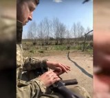 Ukraiński żołnierz zagrał “czerwoną kalinę” na... karabinie maszynowym [WIDEO]
