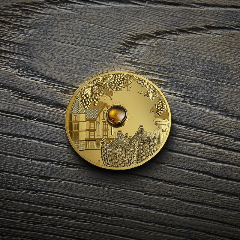 Moneta Cognac Coin kryje w sobie kapsułę z kroplą...