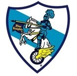 Logo międzynarodowe klubu to rycerz na koniu, wkomponowany w...