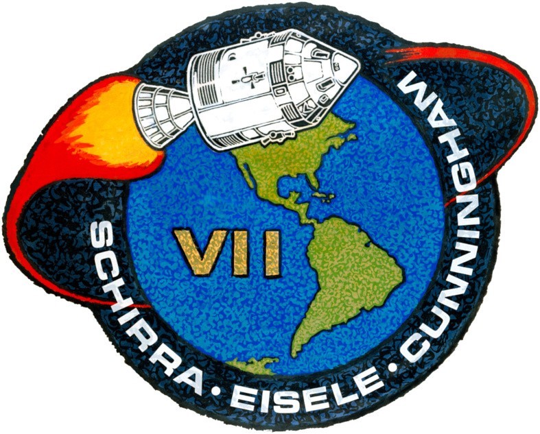 Plakietka Apollo 7. Projekt odzwierciedlał charakter misji,...
