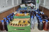 Przejęto ponad 2 tysiące litrów nielegalnego alkoholu o wartości 70 tys. zł. Podlaska KAS zlikwidowała magazyn i rozlewnię bimbru