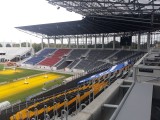 Postępy prac na budowie stadionu Pogoni: montaż pierwszego telebimu i dachu nad północną [ZDJĘCIA]