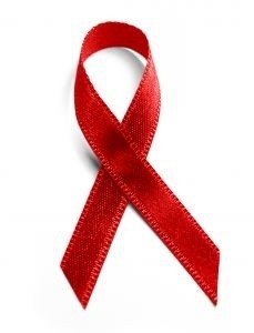 Czerwona wstążeczka - symbol solidarności z zakażonymi HIV i chorymi na AIDS