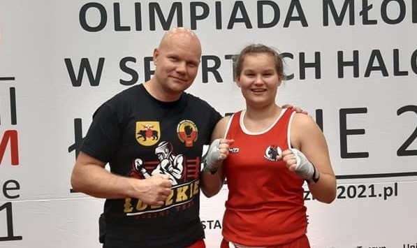 Amelia Kostrzewa i trener Grzegorz Goliński