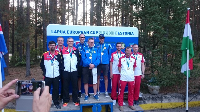 Andrzej Burda (z prawej) na podium z kolegami z reprezentacji.