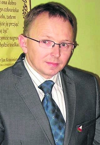 Bogdan Tkocz - radny#Rady Powiatu Mikołowskiego. Należy do...