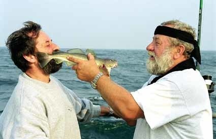 Całowanie ryby w ogon, to tylko część ceremoniału chrztu...