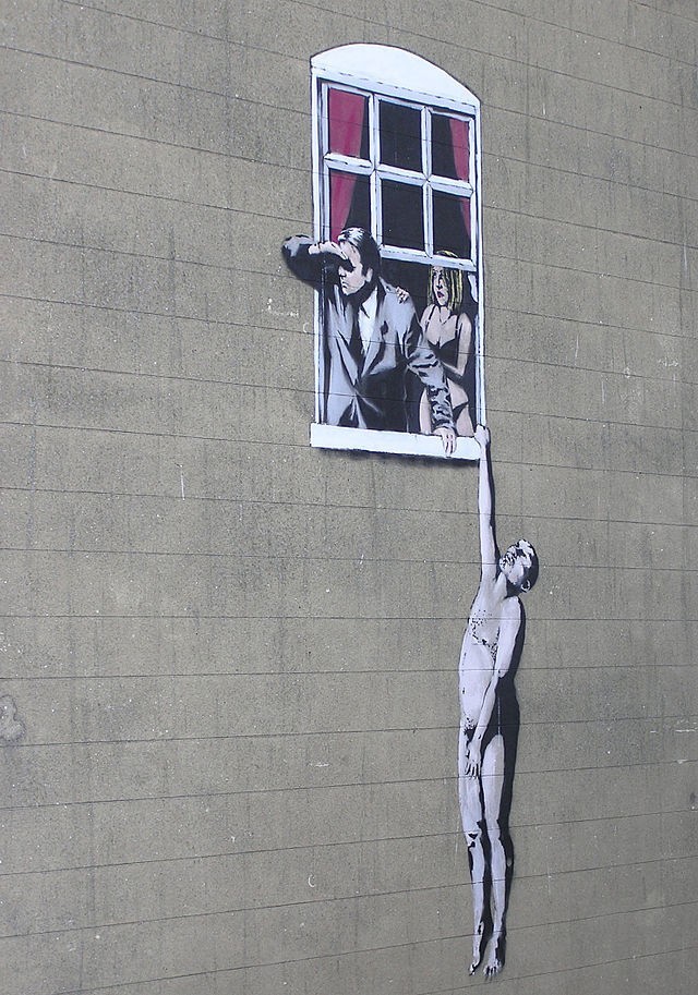 Banksy - Nagi mężczyzna zwisający z okna na skrzyżowaniu...