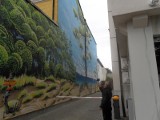W Ustce został odsłonięty mural Cukina - koszalińskiego artysty