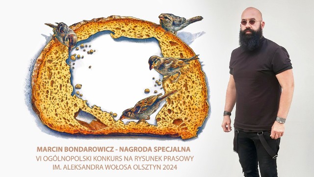 Marcin Bondarowicz z nagrodzoną pracą w konkursie prasowym