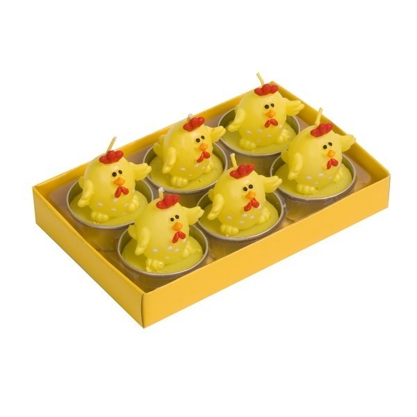 Świeczki kurczaczkiWprowadź radosny nastrój w czasie świąt dekorując stół zabawnymi świeczkami w kształcie kurczaczków.