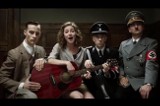 Film AmbaSSada: Więckiewicz jako Hitler śpiewa Sen o Warszawie [ZOBACZ WIDEOKLIP]