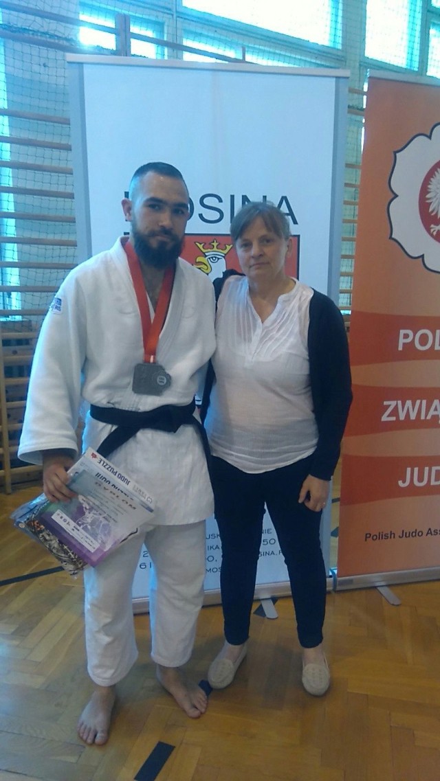 Bartosz Dobranowski z trenerką Anna Chodakowską.