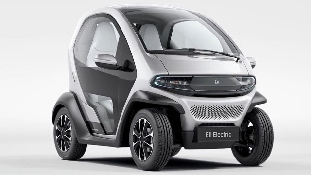 Eli Zero Nowość posiada elektryczny napęd, cztery koła oraz przeszklone drzwi. Pojazdem mogą podróżować dwie osoby, które siedzą obok siebie.Fot. Eli