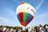 Kraków. OdLOTowa Arena z balonami i samolotami w tle. Można było polecieć balonem, ale na uwięzi