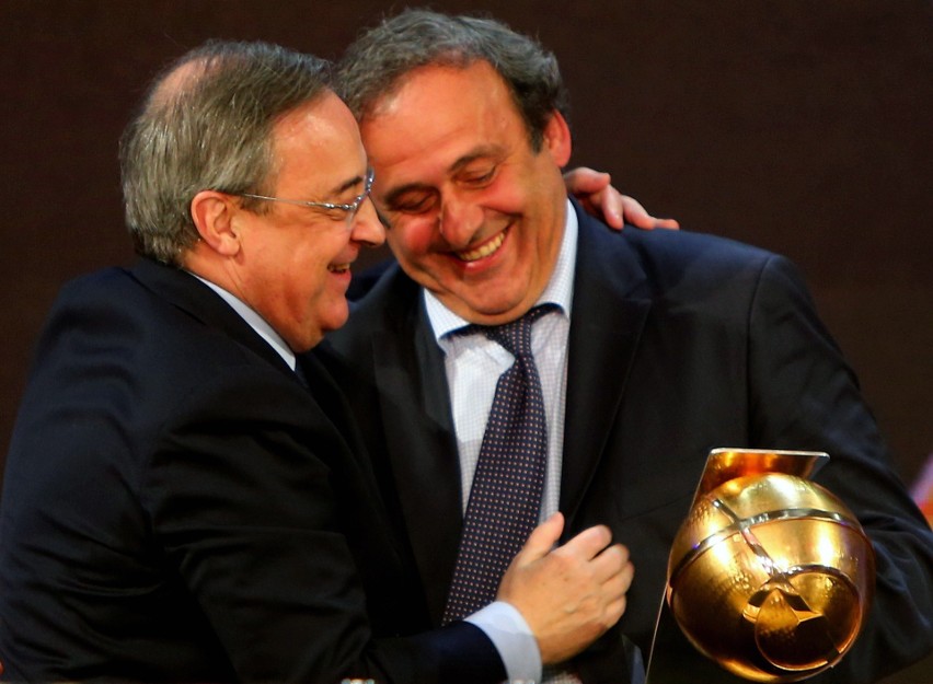 Michel Platini (z prawej - obok prezydent Realu Madryt...