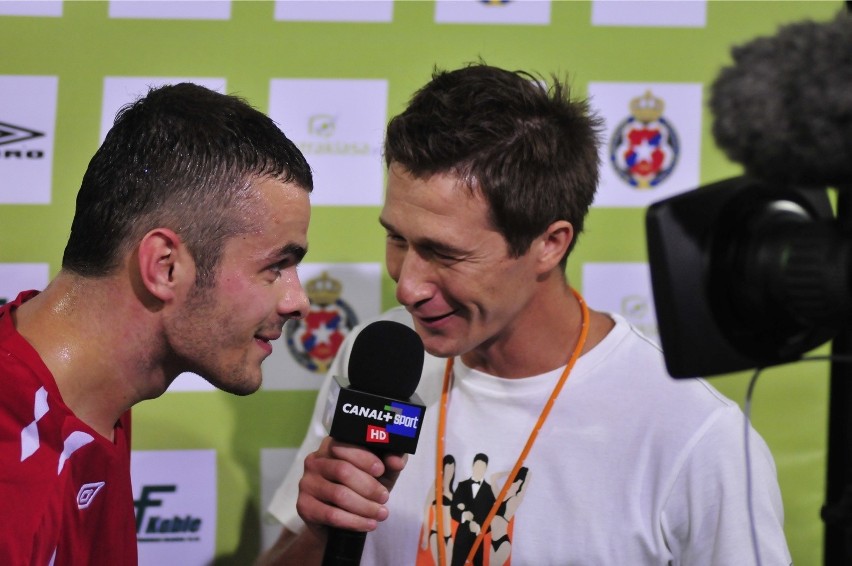 Szymkowiak jako reporter Canal + Sport przeprowadza wywiad z...