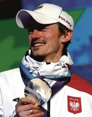 Widać, że kolejny srebrny medal olimpijski Adama Małysza naprawdę ucieszył fot. PAP/Grzegorz Momot