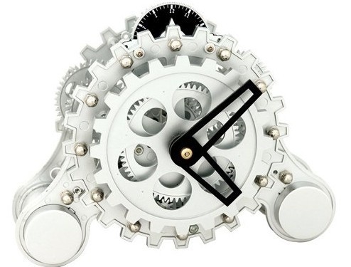Zegar mechaniczny RetroZegar nawiązujący wyglądem do pradawnych zegarów mechanicznych. Możemy obserwować upływający czas patrząc na obracające się koła zębate.