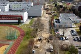 Nowe parkingi, zieleńce i pasaż w Dąbrowie Górniczej. Osiedle Mydlice i teren wokół szkoły, przedszkola i żłobka całkowice się zmieni