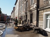 Pożar mieszkania w kamienicy przy ulicy Niepodległości w Koszalinie. Ewakuowano mieszkańców [ZDJĘCIA]
