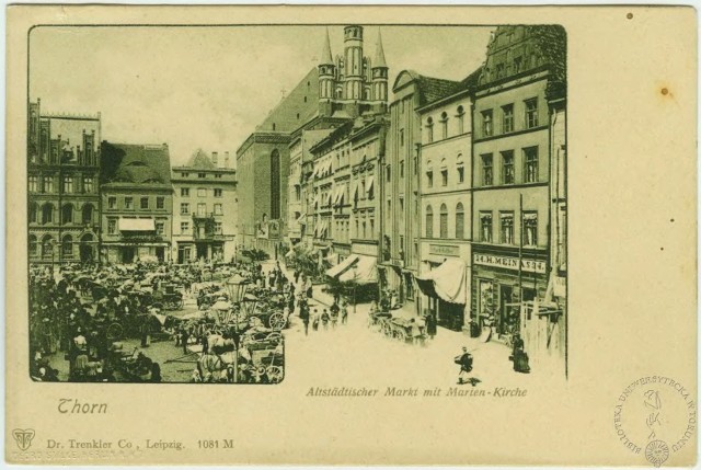 Targ na toruńskim Rynku Staromiejskim pod koniec XIX wieku. Witryna sklepu Mallonów przysłonięta wielką markizą.
