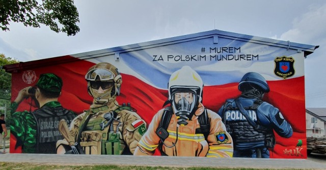 Na remizie OSP Kochcice powstał mural z przesłaniem. Są na nim polskie służby mundurowe