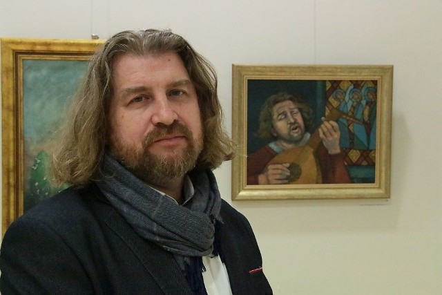 Edward Gałustow z portretem namalowanym przez Małgorzatę Bogucką.