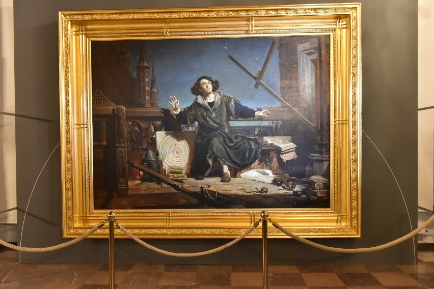 Obraz przedstawiający Mikołaja Kopernika otoczonego...