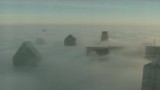 Dallas pokryte mgłą. Widać tylko wierzchołki wieżowców
