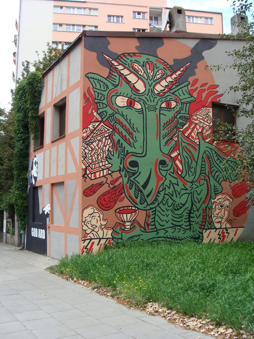 Nowy mural na Kozinach: zielony smok i człowiek z różańcem [ZDJĘCIA]