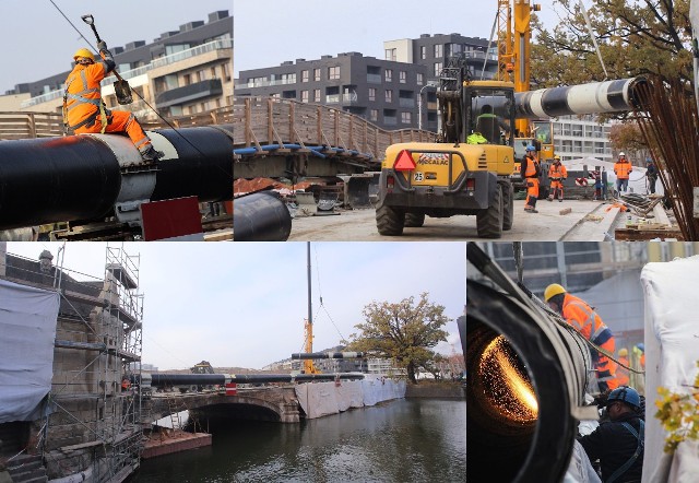 Robotnicy demontują stary ciepłociąg przebiegający po jednym z przebudowywanych mostów Pomorskich w centrum Wrocławia.