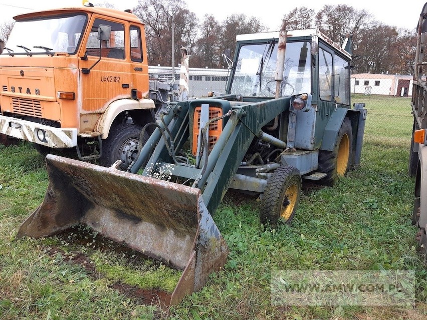 Koparko-ładowarka K-162 na ciągniku kołowym...