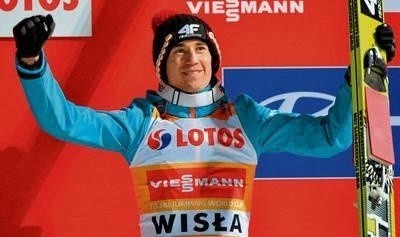 Tak Kamil Stoch cieszył się z miejsca na podium Pucharu Świata, stanął na nim po raz 21. w karierze FOT. PAP/GRZEGORZ MOMOT