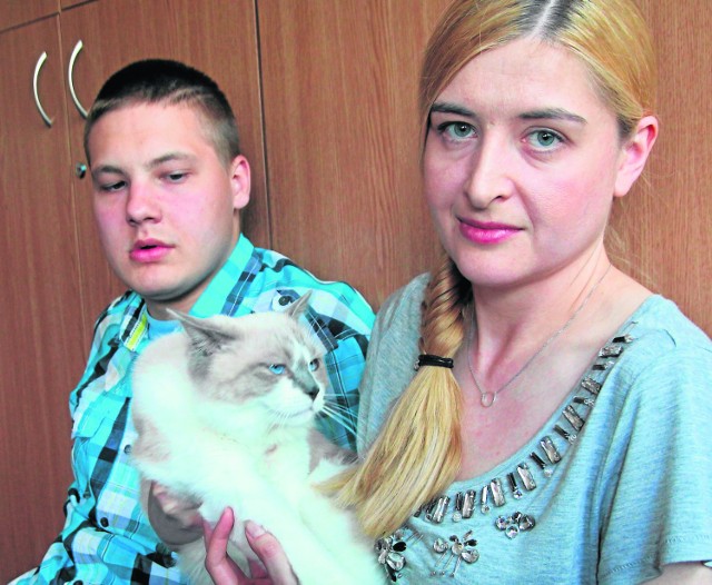 Anna Siatecka z podopiecznym Kamilem oraz kotem Hektorem