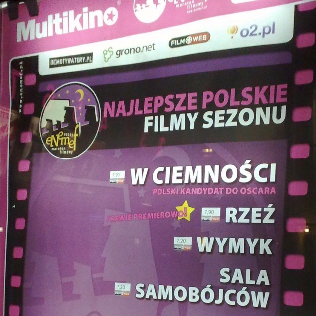 Plakat ENEMEF przed wejściem do kina.