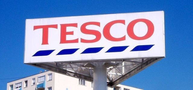 Logo grupy "Tesco".