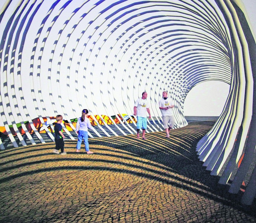Ażurowy tunel i nasypy ziemi w kształcie fal
